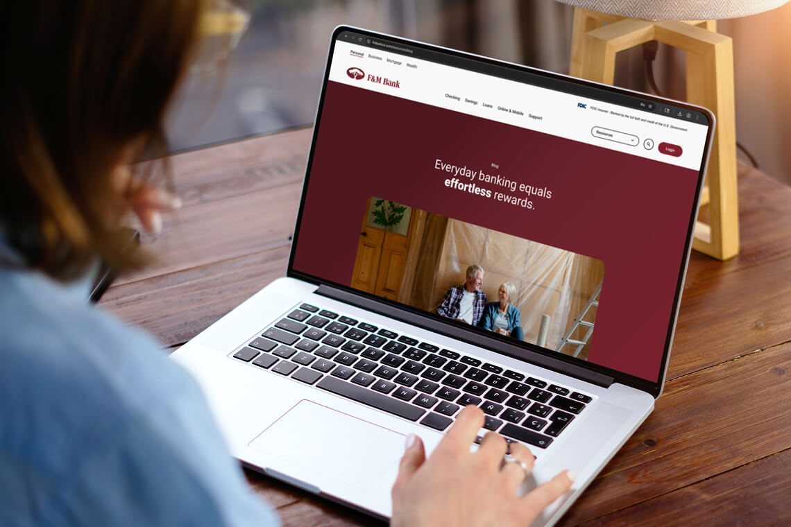 Woman exploring F&M Bank's blog.