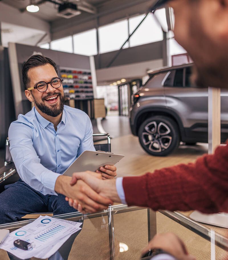 Hand shake during car purchase.
