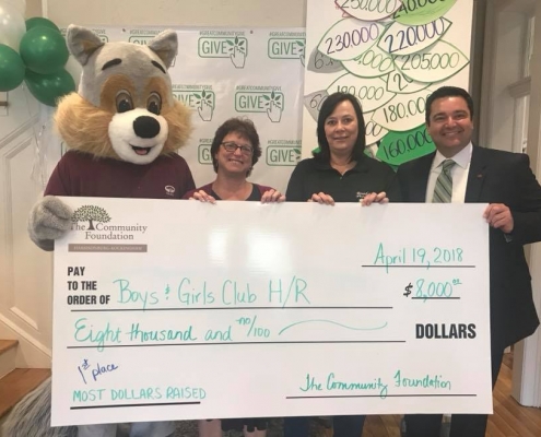 FM Bank presents a check