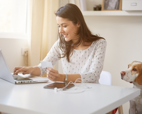 Woman Holding a Check