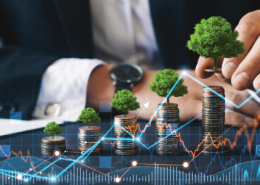 Photo of miniature trees set on stacks of coins with line graph overlay
