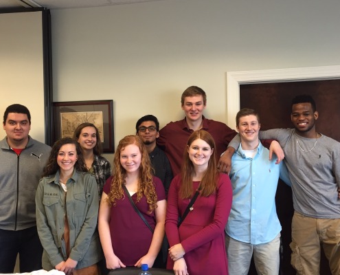 A group of high school students pose for a picture after a visit to F&M Bank's Bank Day