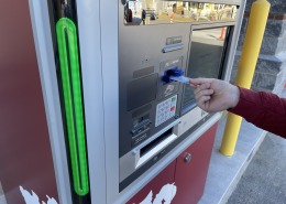 Picture of hand inserting a card into F&M Bank ATM machine