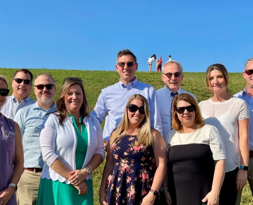 Group photo of F&M Bank Associates at Bluestone Vineyard celebrating a win in Shenandoah Valley's Best contest