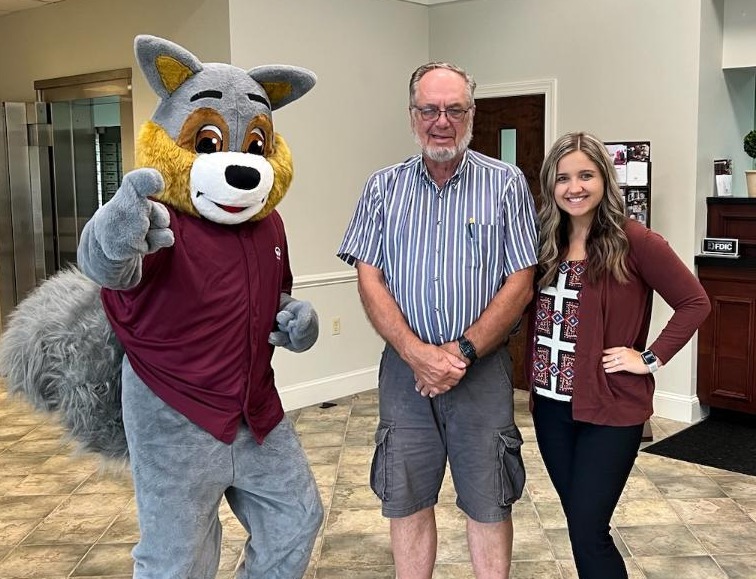 One of our lucky winners pictured with Assistant Branch Manager, Katie Robertson and F&M Mascot, Sammie the Squirrel 